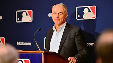 (FILES) In this file photo taken on February 10, 2022 Major League Baseball Commissioner Rob Manfred answers questions during an MLB owner's meeting at the Waldorf Astoria in Orlando, Florida. - Major League Baseball cancelled three more days of pre-