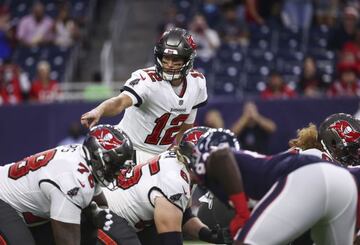 Aug 28, 2021; Houston, Texas, USA; Tampa Bay Buccaneers quarterback Tom Brady (12) calls a play at the line of scrimmage during the first quarter against the Houston Texans at NRG Stadium. Mandatory Credit: Troy Taormina-USA TODAY Sports